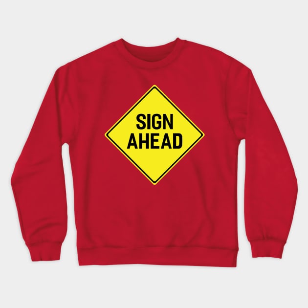 'Sign Ahead' Ironic Yellow Road Sign Crewneck Sweatshirt by fizzyllama